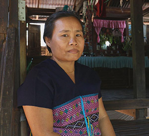 Karen Ethnic woman in Myanmar in her doorway